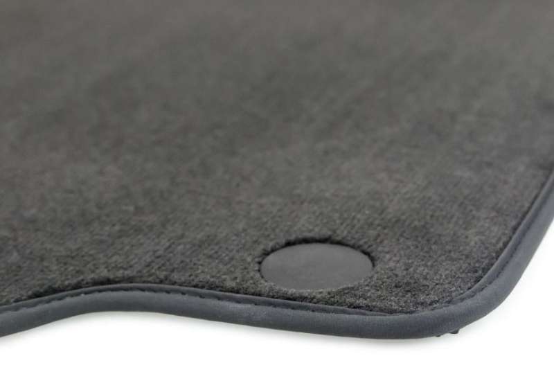 Textile car mats safety plugs that prevent the carpet from slipping